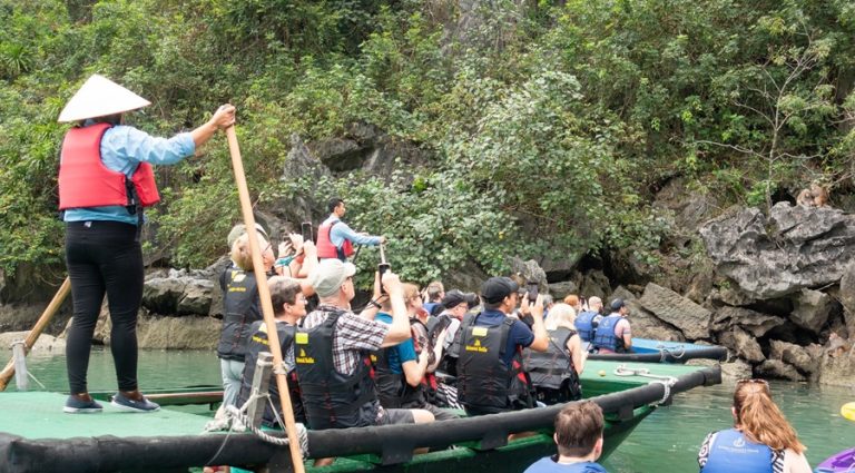 Explore Halong Bay on bamboo boat
