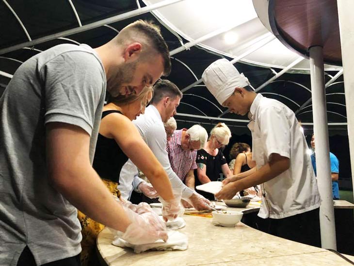 Making Nem - a traditional Vietnamese food on Starlight cruise